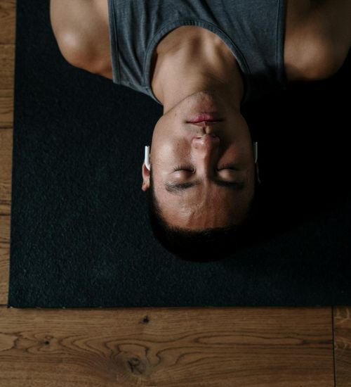 A man in a state of calm focus and readiness before an exercise.